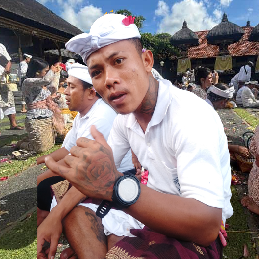 Gede from the maintenance and gardening team